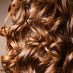 caramel highlights on curly hair